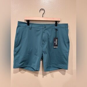 NWT Rhone 7" Commuter Short in Mallard Green Size 38 Flat Front Chino Golf NEW